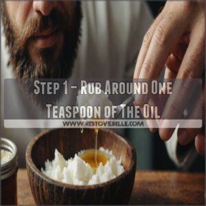 Step 1 – Rub Around One Teaspoon of The Oil